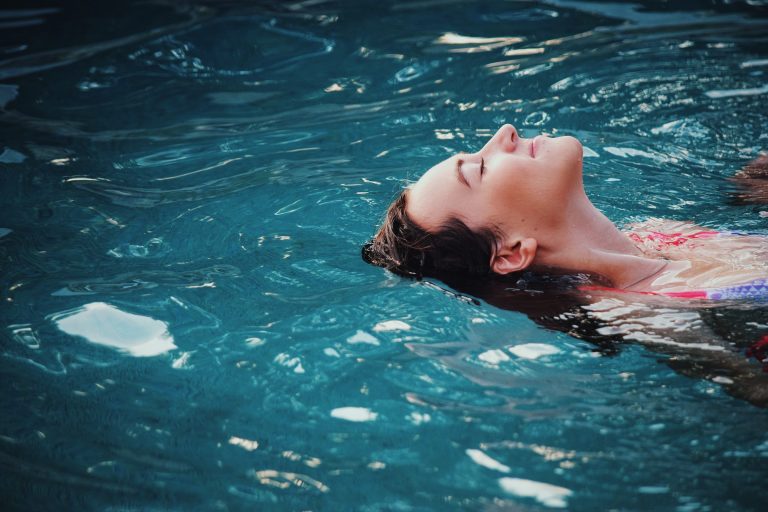 [5 Best Solutions] How to Listen to Music While Swimming (2023)